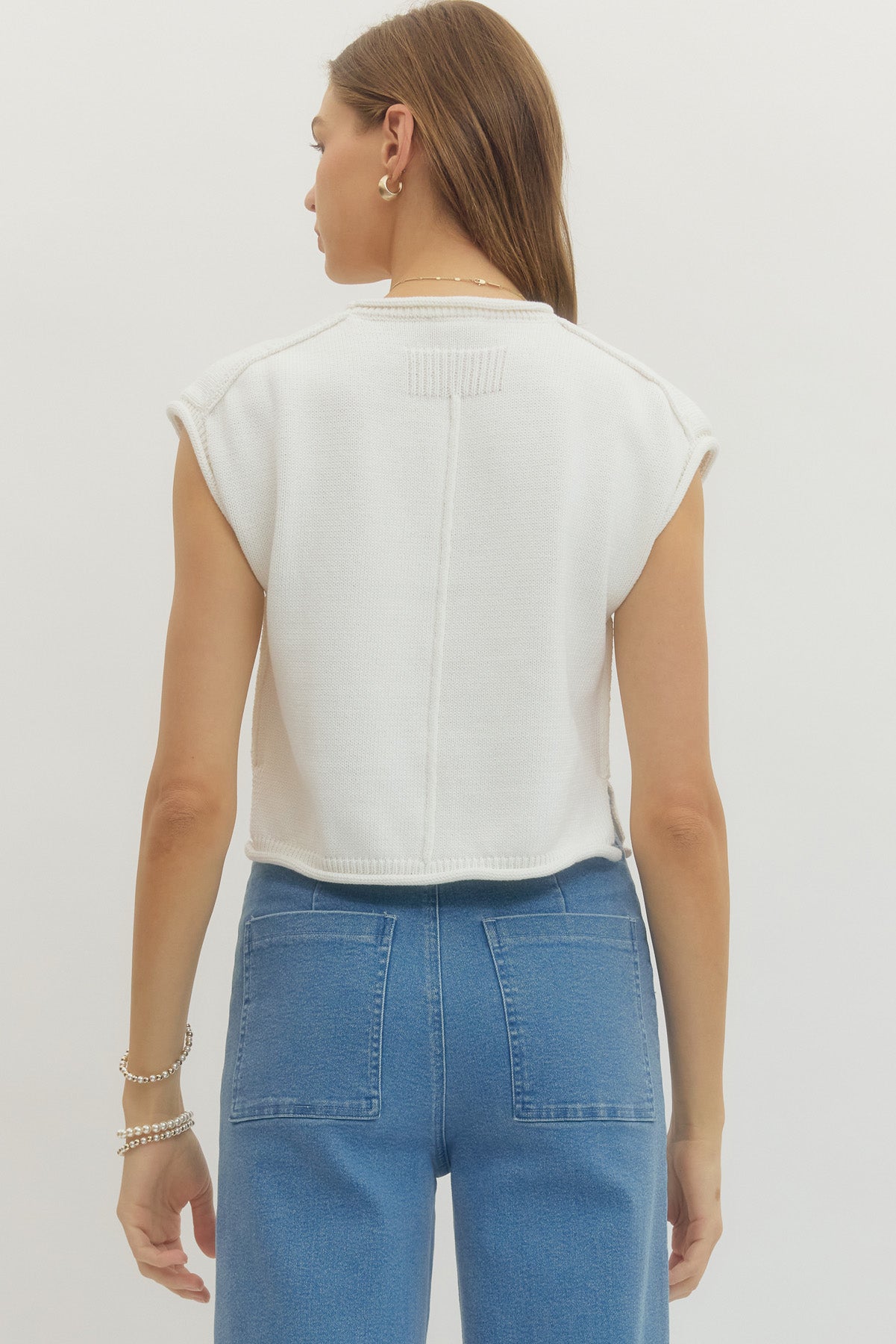 White shirt sleeve sweater